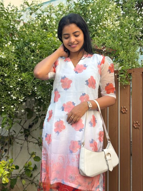 White and orange flower kurti